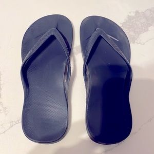 Archie’s flip flops